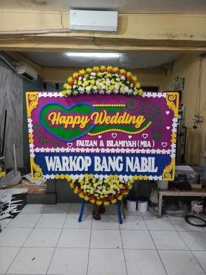 Papan Bunga di Lombang Juntinyuat