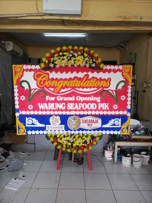 Papan Bunga di Lombang Juntinyuat